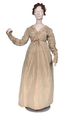 Lot 526 - A beige silk taffeta day dress, circa 1805