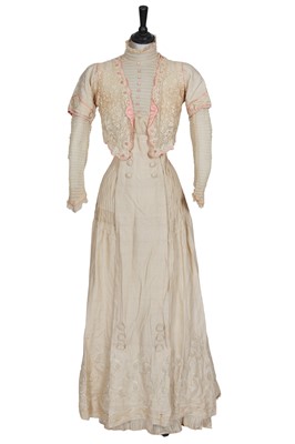 Lot 709 - A group of ivory garments, accessories and textiles, mainly early 1900s