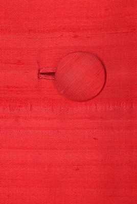 Lot 193 - A Christian Dior couture red slubbed silk coat,...