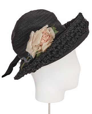 Lot 617 - A Christian Dior black straw hat, circa 1960