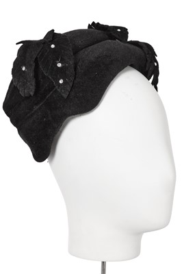Lot 621 - A Christian Dior black wool hat, early 1960s