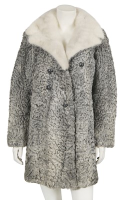 Lot 654 - A Schiaparelli grey astrakhan coat, late 1950s-early 60s