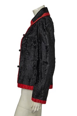 Lot 464 - A Hubert de Givenchy haute couture black and red breitschwanz jacket, 1980s