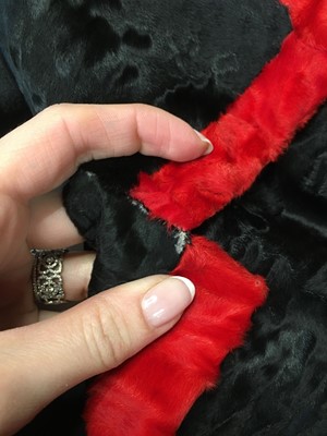 Lot 464 - A Hubert de Givenchy haute couture black and red breitschwanz jacket, 1980s