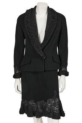 Lot 386 - A Christian Dior by John Galliano black crêpe and lace suit, commercial collection 1998