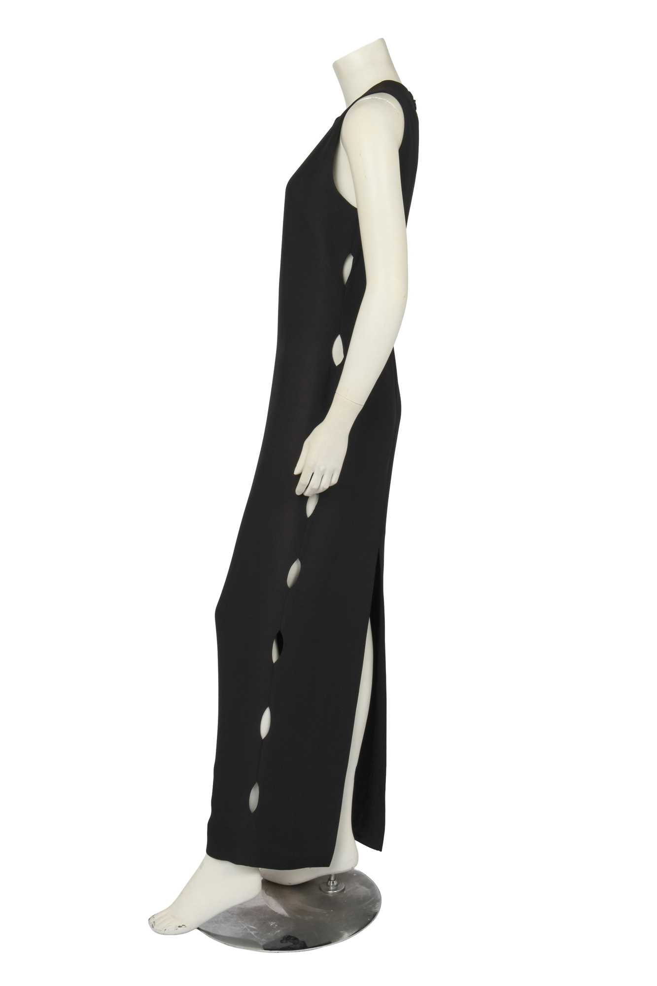 Lot 294 - A Gianni Versace black rayon cut-out evening gown, Spring-Summer 1994
