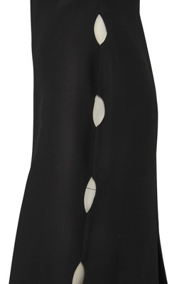 Lot 294 - A Gianni Versace black rayon cut-out evening gown, Spring-Summer 1994