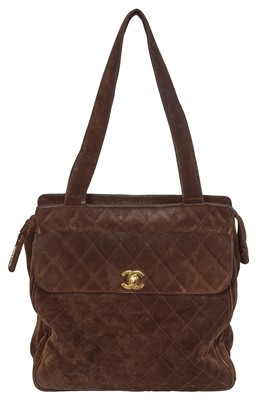 Lot 43 - A Chanel brown suede quilted shoulder bag, 1980s