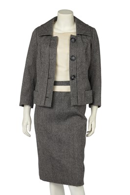Lot 616 - A Christian Dior New York grey tweed suit, circa 1960