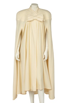 Lot 213 - An Yves Saint Laurent ivory wool evening cape, circa 2000