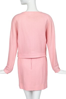 Lot 49 - A Chanel by Karl Lagerfeld pink bouclé suit, circa 1987-88