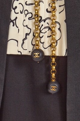 Lot 39 - A Chanel by Karl Lagerfeld printed silk and black wool ensemble, Spring-Summer 1993