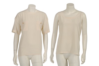 Lot 25 - Two Chanel by Karl Lagerfeld ivory silk blouses, circa 1990