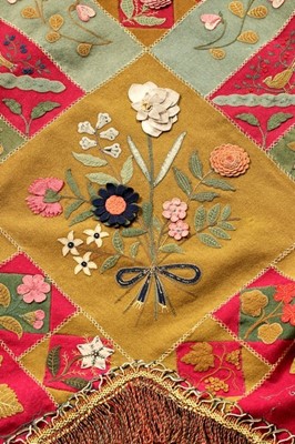 Lot 146 - A good wool patchworked coverlet, English,...