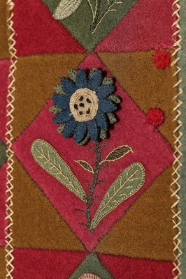 Lot 146 - A good wool patchworked coverlet, English,...