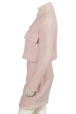 Lot 302 - A Gianni Versace haute couture pink tweed suit, circa 1994