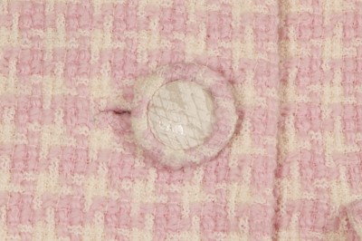 Lot 302 - A Gianni Versace haute couture pink tweed suit, circa 1994