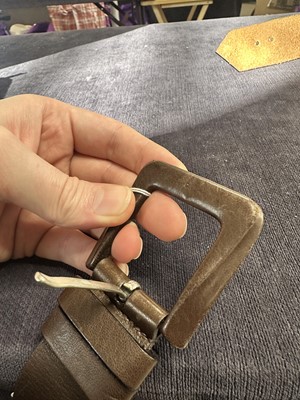 Lot 61 - A group of designer belts and accessories