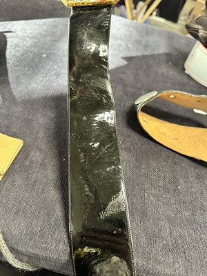 Lot 61 - A group of designer belts and accessories