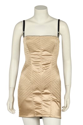 Lot 218 - A Dolce & Gabbana champagne satin bodycon dress, early 2000s