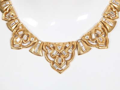 Lot 79 - An Yves Saint Laurent gilt and rhinestone necklace and earrings, late 1970s-80s