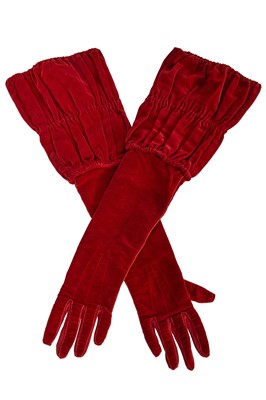 Lot 500 - A pair of Gabrielle Chanel red velvet evening gloves, circa 1931