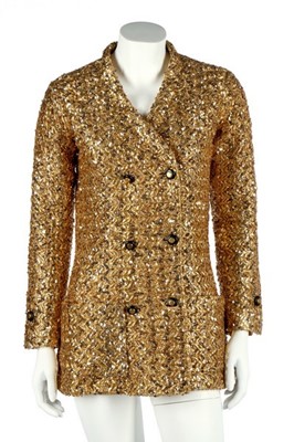 Lot 232 - A Chanel couture gold lurex-weave jacket, 1969,...