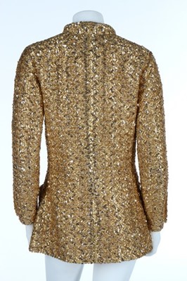 Lot 232 - A Chanel couture gold lurex-weave jacket, 1969,...