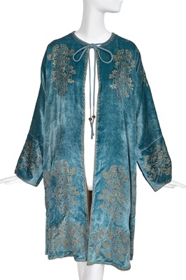 Lot 511 - A Mariano Fortuny stencilled aquamarine velvet opera coat, 1920s