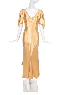 Lot 491 - A Jean Patou couture oyster satin evening gown, early 1930s