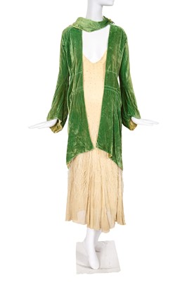 Lot 493 - A green velvet opera coat, probably Patou, 1928-30 and an ostrich trimmed georgette dress, 1930s