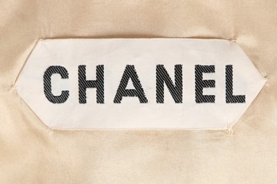 Lot 254 - A Chanel couture evening ensemble, 1972,...