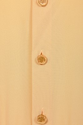 Lot 21 - A Chanel by Karl Lagerfeld peach and brown silk and tweed ensemble, Cruise 2001