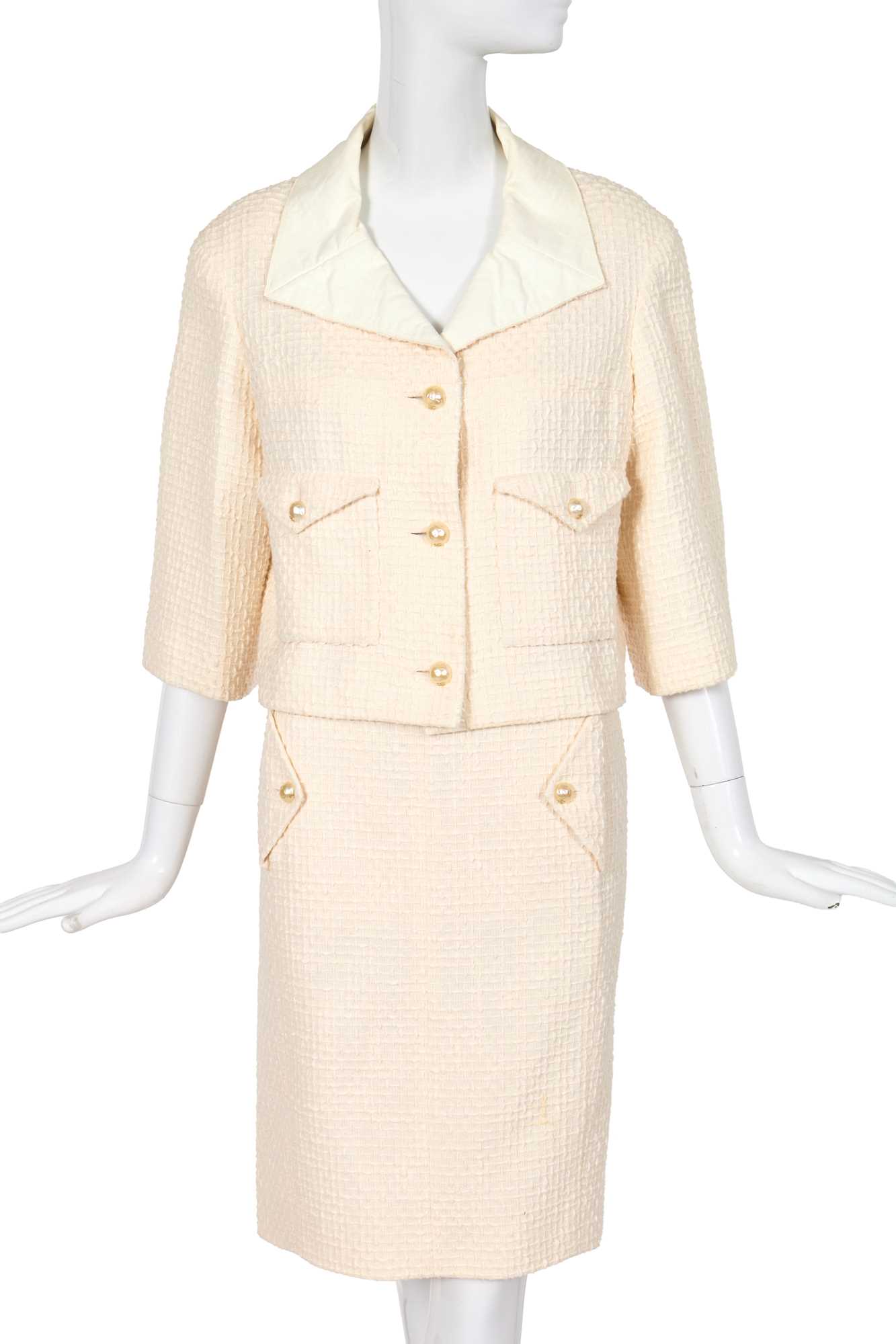 Lot 10 - A Chanel by Karl Lagerfeld white cotton tweed suit, Spring-Summer 2012