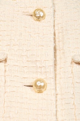 Lot 10 - A Chanel by Karl Lagerfeld white cotton tweed suit, Spring-Summer 2012