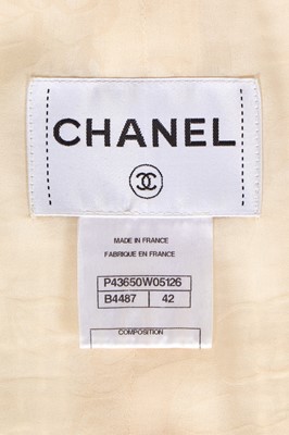 Lot 10 - A Chanel by Karl Lagerfeld white cotton tweed suit, Spring-Summer 2012