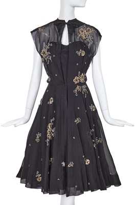 Lot 480 - A Jean Dessès haute couture embellished black cocktail dress, circa 1950