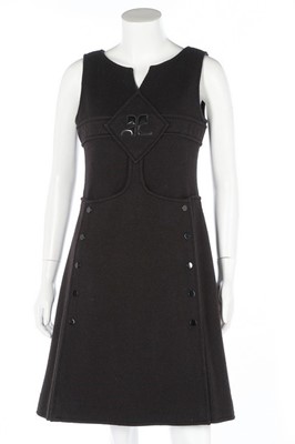 Lot 260 - A Courrèges black knitted jersey dress, early...