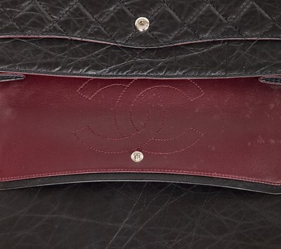 Lot 12 - A Chanel 2.55 Reissue black leather flap bag, 2009-2010