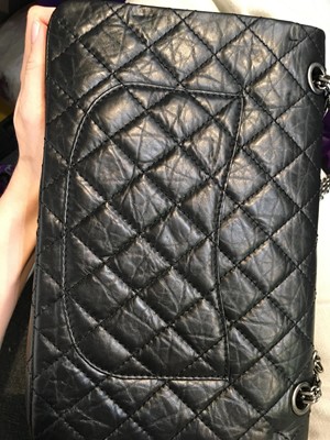Lot 12 - A Chanel 2.55 Reissue black leather flap bag, 2009-2010