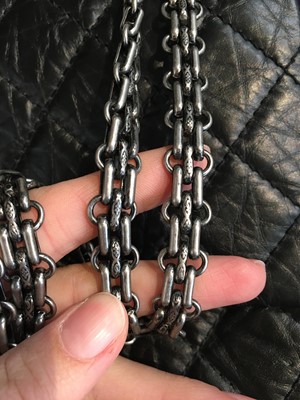 Lot 12 - A Chanel 2.55 Reissue black leather flap bag, 2009-2010