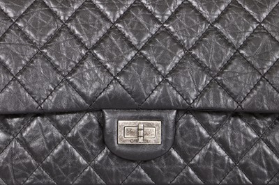 Lot 12 - A Chanel 2.55 Reissue black leather flap bag, 2009-2010