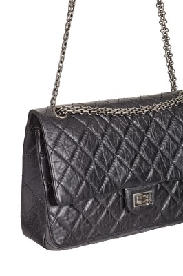 Lot 12 - A Chanel 2.55 Reissue black leather flap bag, 2009-2010