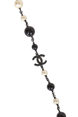 Lot 11 - A Chanel by Karl Lagerfeld black bead and faux pearl sautoir, Spring-Summer 2011