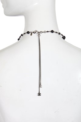 Lot 13 - A Chanel by Karl Lagerfeld black bead and faux pearl sautoir, Spring-Summer 2010