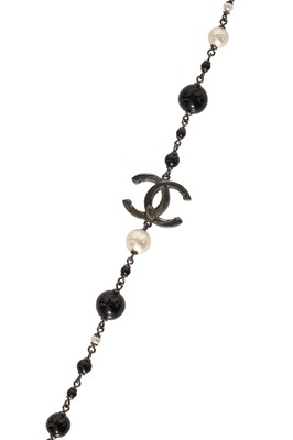 Lot 13 - A Chanel by Karl Lagerfeld black bead and faux pearl sautoir, Spring-Summer 2010