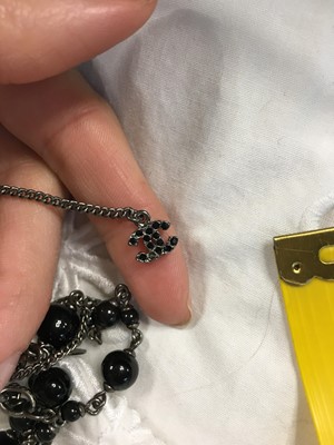 Lot 13 - A Chanel by Karl Lagerfeld black bead and faux pearl sautoir, Spring-Summer 2010