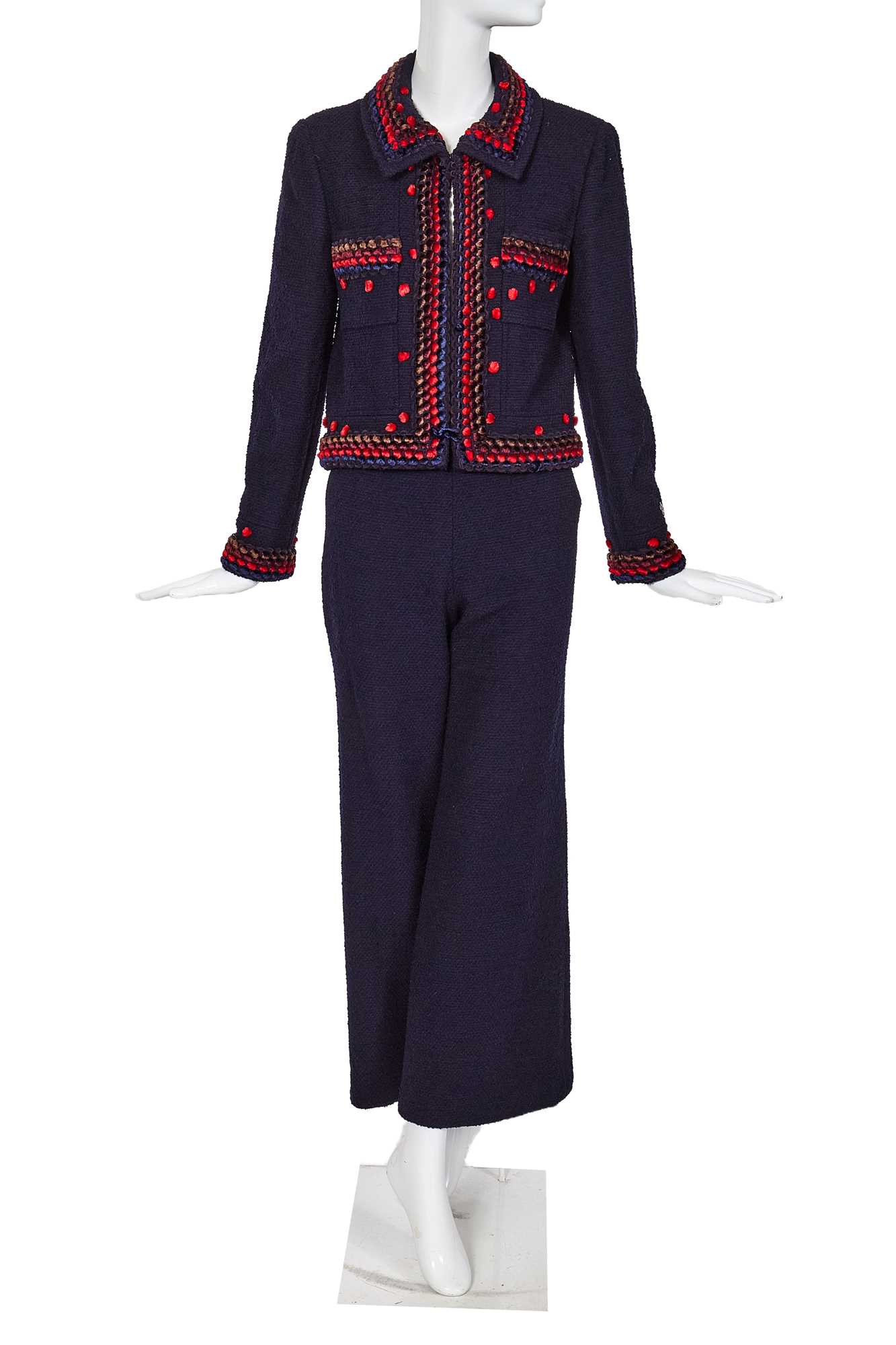 Lot 27 - A Chanel by Karl Lagerfeld navy blue bouclé wool suit, Autumn-Winter 1997-98