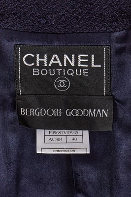 Lot 27 - A Chanel by Karl Lagerfeld navy blue bouclé wool suit, Autumn-Winter 1997-98