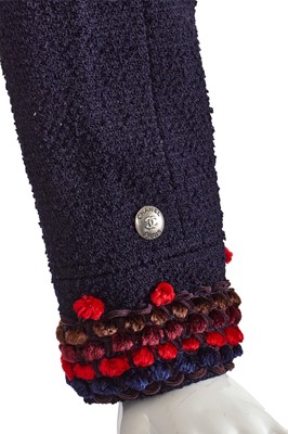 Lot 27 - A Chanel by Karl Lagerfeld navy blue bouclé wool suit, Autumn-Winter 1997-98